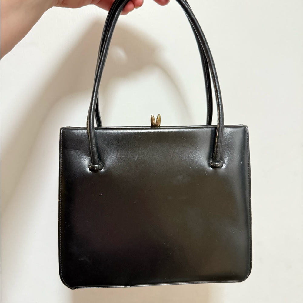 Sleek Black Mini Bag with Gold Clasp